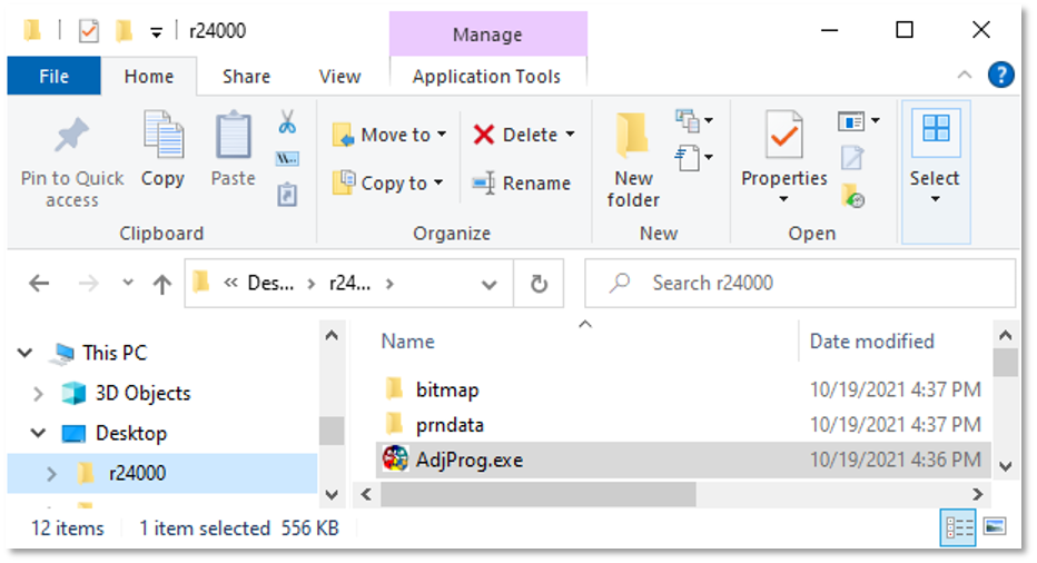 Windows File Explorer with AdjProg.exe selected