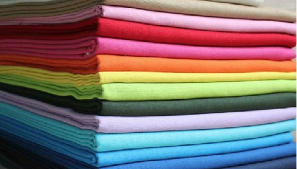 Stack of colorful folded fabrics