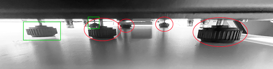 Adjustable height feet on the DTF Mini printer & film roll bracket.